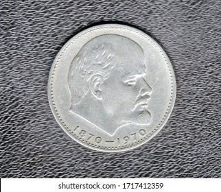 Reverse of the commemorative Soviet one ruble with a portrait of Vladimir Lenin, issued for the 100th anniversary (1870-1970) of V. I. Lenin. Isolated on a black background