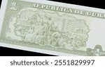 Reverse of One Peso banknote printed by Cuba, that shows Illustration of Fidel Castro and victory parade