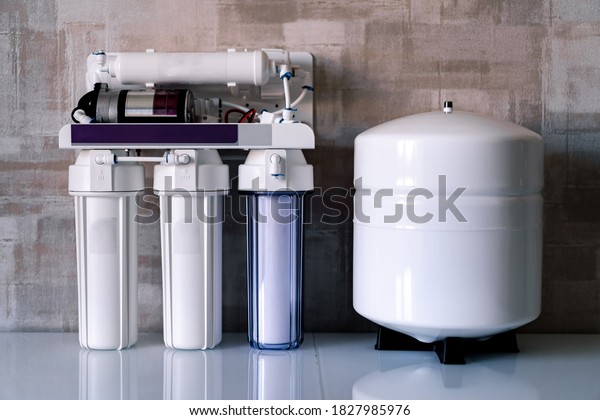 Reverse osmosis\
water purification system at home. Installed water purification\
filters. Clear water\
concept