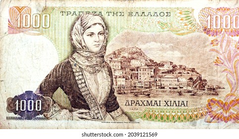 Reverse side of 1000 one thousand Greek Drachmas Drachmai banknote currency issued 1970 in Greece features a woman, girl in local costume and Hydra Island, old Greek money, vintage retro