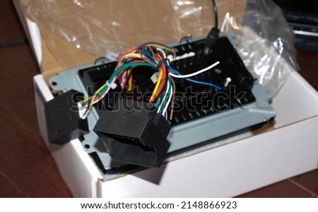 The reverse side of the car stereo