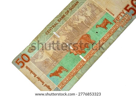 Reverse side of a Sudan 50 Pounds banknote featuring agricultural symbols of images of livestock, including camels, a cow, and a goat, issued by the Central Bank of Sudan