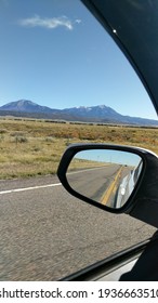 Review Mirror On 1-80 Somewhere In Wyoming.