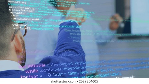 Reviewing code, two engineers collaborating on monitor in meeting room, with code overlays. Teamwork, innovation, technology, modern, professional, digital, corporate