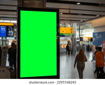 Revolutionizing Airport Advertising: Captivate Travelers with an Interactive Marketing Billboard Featuring Green Screen. Engaging Calls-to-Action and Amplify Your Message with a Green Screen Billboard - Powered by Shutterstock