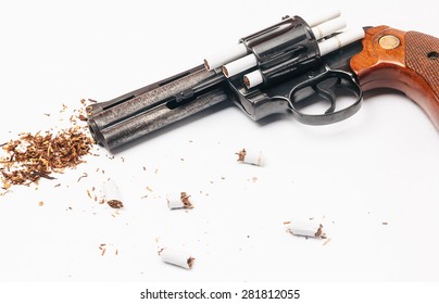 Revolver loaded with cigarettes to symbolize the dangers of smoking