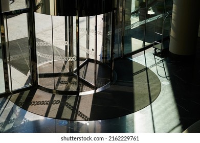 revolving doors in the lobby, entrance group from inside the building towards the street