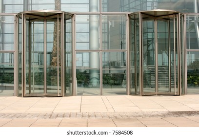 Revolving Glass Doors On Glass Walled Building