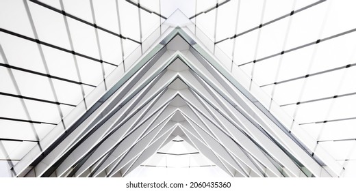 Reworked Photo Of Modern Architecture. Abstract Steel And Glass Sturcture Of Hi-tech Building. Macro Photo Of Business Real Estate. Material Geometric Background With Transparent Triangular Pattern.