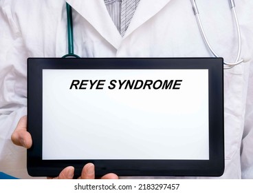 Reye Syndrome.  Doctor With Rare Or Orphan Disease Text On Tablet Screen Reye Syndrome