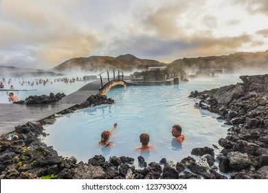 Reykjanes Peninsula, Iceland -October 17, 2018:Landscape View Of The Beautiful Hot Spring/ Blue Lagoon With Crowds Of People At Sunset