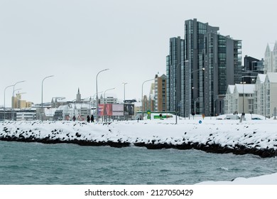 Reykjavik Iceland February 21 2022 Snow Storm And Windy Weather In Winter In Downtown City Streets Covered In Snow, Cars Vehicles Covered And Stuck In Snow On The Road