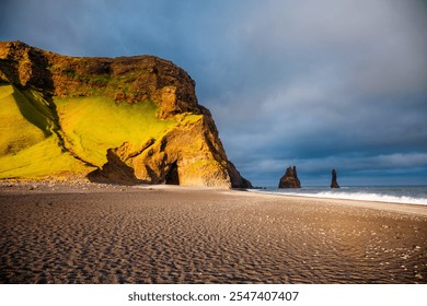 Reynisdrangar basalt sea stacks (Troll toes) and the rugged cliffs on the Reynisfjara black sand beach. Location place Vik I Myrdal, Iceland, Europe. Photo wallpaper. Discovery the beauty of earth. - Powered by Shutterstock