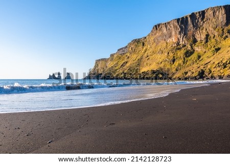 Reynisfjara beach in Vík í Mýrdal in Iceland with a magnificent view of the Reynisdrangar rock formations