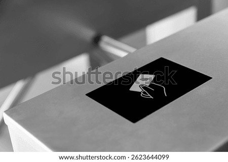 RFID card access control system on modern stainless steel turnstile gate in smart office building, contactless security entrance, workplace access, biometric ID, secure entry technology