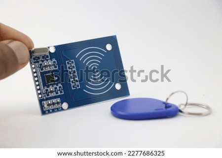 RFID reader module and rfid tag on a white background