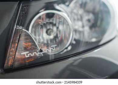 RFID Tags Used To Pay Tolls Are On The Headlights Of The Car