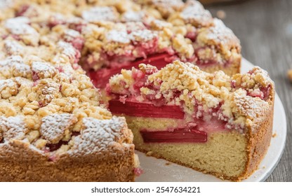 Rhabarberkuchen (Rhubarb Cake): A spring favorite, this cake features tart rhubarb, often with a streusel topping. - Powered by Shutterstock