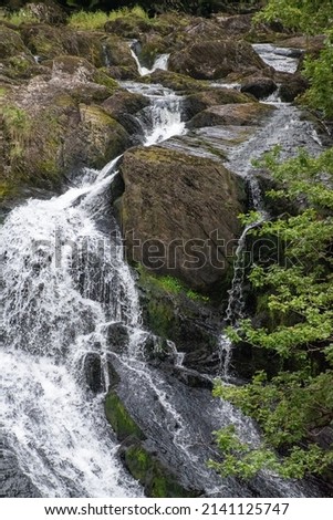 Rhaeadr Ewynnol (Swallow Falls) waterfall, close to the town of Betws-y-Coed. In Snowdonia National Park, north Wales