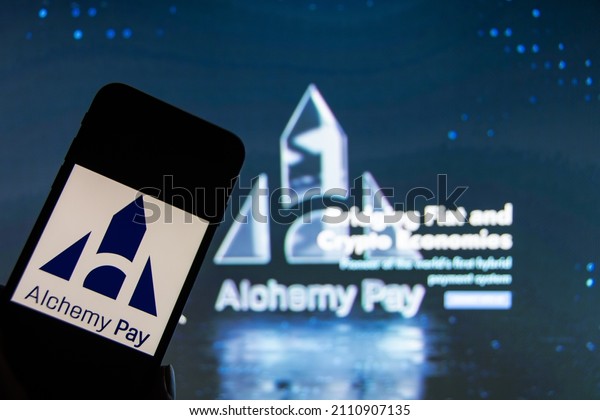 Rheinbach, Germany  18 January  2022,  The logo of the cryptocurrency "Alchemy Pay" on the display of a smartphone in front of the website 