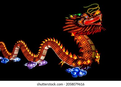 Rhenen, The Netherlands - December 2018 : China Light Festival In Ouwehands Dierenpark Shows China Dragon Creatures In The Dark Created With Led Lights 