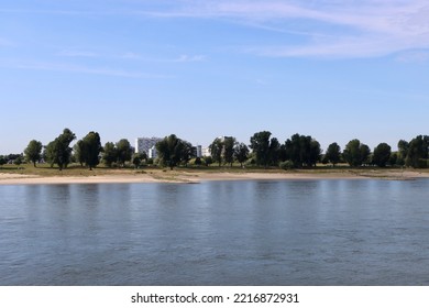 Rhine River On A Sunny Summer Day, Low Water Conditions Due To Prolonged Draught. Dusseldorf, North Rhine-Westphalia, Germany