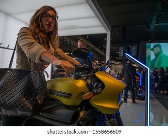 Rho, Milan  Italy 05-11-2019: Young Woman Sit On Harley Davidson LiveWire At Eicma