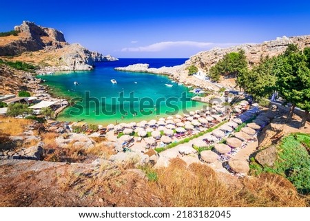 Rhodes, Greece. Saint Paul bay, Aegean Sea landscape with ancient town of Lindos and Acropolis rocky ruins.