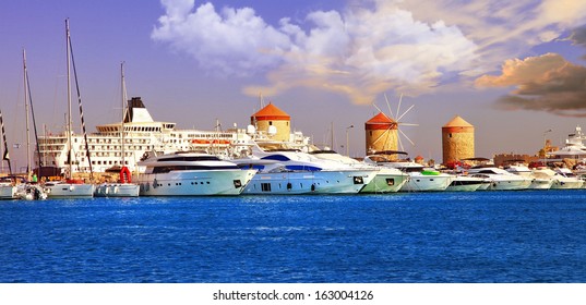 Rhodes, Mandraki Port On Sunset. Greece