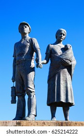 Rhondda Valley - UK, July 17, 2012. Statue Of A Rhondda Valley Coal Miner And His Family. South Wales,