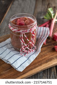 Rhubarb compote fresh and homemade cooked in a glass jar