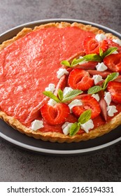 Rhubarb Strawberry Tart With Mousse Close-up On The Table. Vertical
