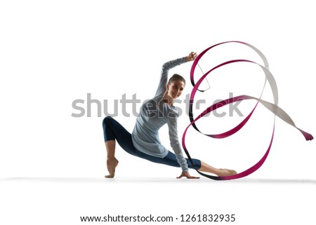 Rhythmic gymnast isolated on white