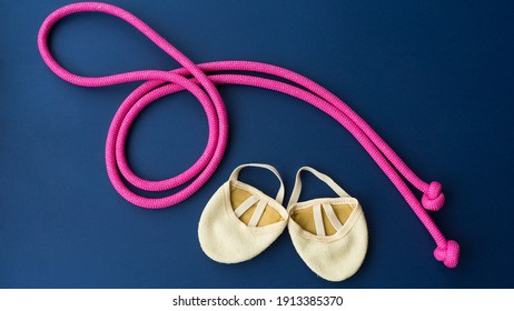 Rhythmic Gymnastics Equipment On A Blue Background