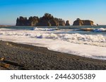 Rialto Beach with sea stacks in Washington State. Rialto Beach, situated within Olympic National Park, is positioned to the north of La Push, the Quileute Tribe