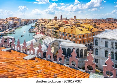 Rialto Bridge above Grand Canal. View from rooftop lookout terrace of the Fondaco dei Tedeschi. Venice, Italy - Shutterstock ID 2038199087