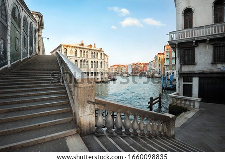 Rialto Bridge and Grand Canal, Venice, Italy - empty staircase and embankment in famous italian city