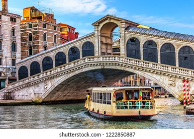 Rialto bridge and vaporetto in Venice, Italy