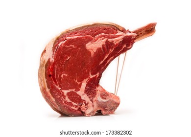 Rib Of Beef Joint Isolated On A White Studio Background.