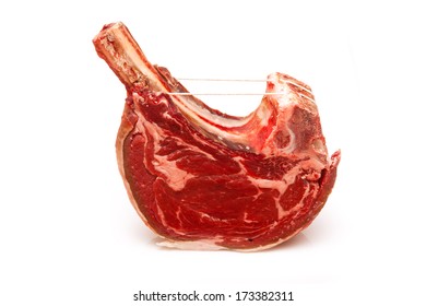 Rib Of Beef Joint Isolated On A White Studio Background.