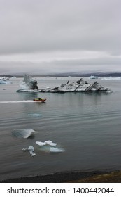 RIB Boat Taking Tour Group Past Icebergs In Jokulsarlon Glacier Lagoon, Vatnajokull National Park, South Coast Iceland, September 2018.