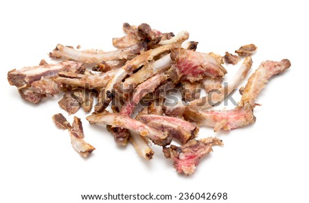 Rib bones picked clean of meat on a white background