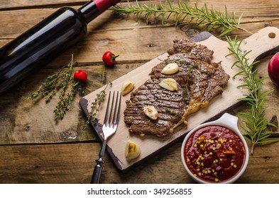 Rib Eye Steak With Garlic, Pepper And Red Wine