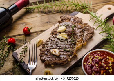 Rib Eye Steak With Garlic, Pepper And Red Wine