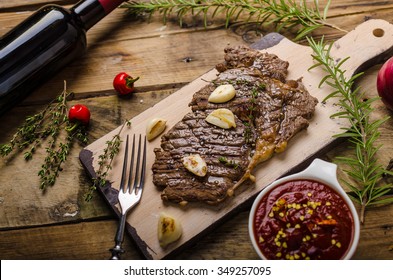 Rib Eye Steak With Garlic, Pepper And Red Wine