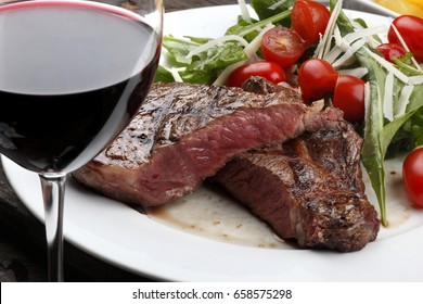 Rib Fillet With Salad And Red Wine