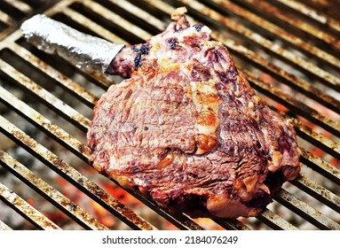 Ribeye Steak Bone In Cooking On The Grill