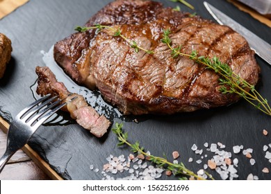 ribeye steak on a blackboard