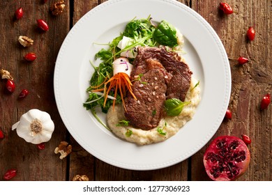 Rib-eye Steak With Sweet Potato-herb Purée And Leaf Lettuce                               