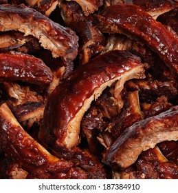 Ribs Grilled Barbecue Meat With A Close Up View Of A Group Of Delicious Cooked Marinated Spare Rib As  Gourmet Food For Dinner At A Restaurant Or Backyard BBQ Grill.